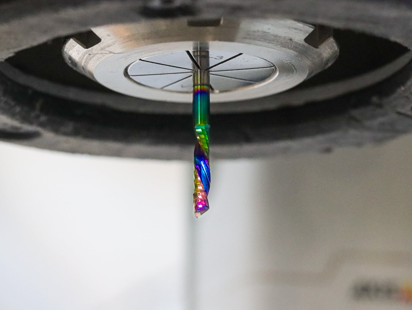 Atlas Tools Compression Spiral 1F 3.175x12 (DLC Coating) ULTRACLEAN for ACM and ACP viewed in tool holder up close from bottom