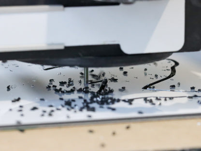 Atlas Tools Compression Spiral 1F 3.175x12 (DLC Coating) ULTRACLEAN for ACM and ACP cutting in action viewed closeup