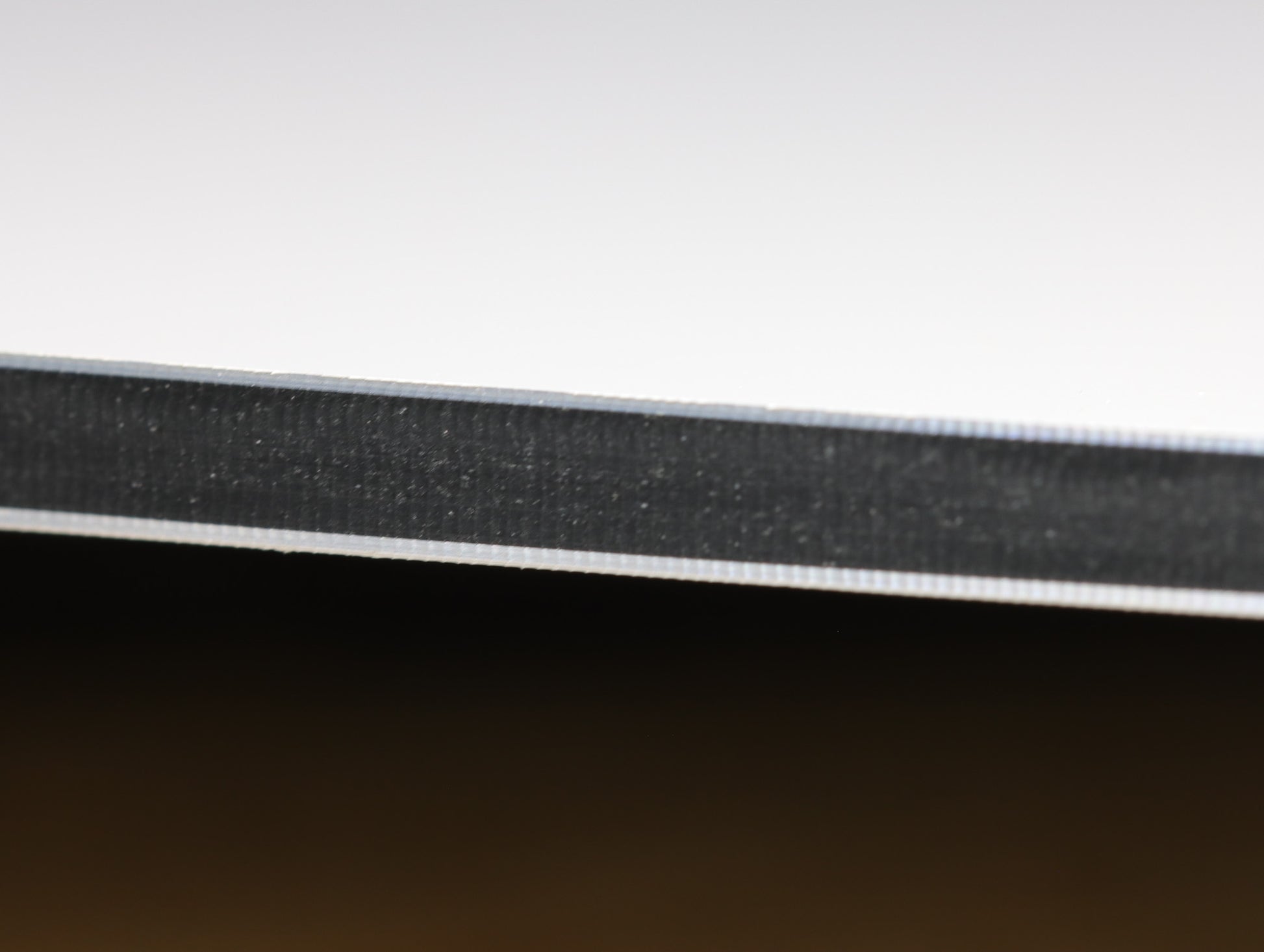 Atlas Tools Compression Spiral 1F 3.175x12 (DLC Coating) ULTRACLEAN for ACM and ACP view of very clean cut edge extreme close-up 