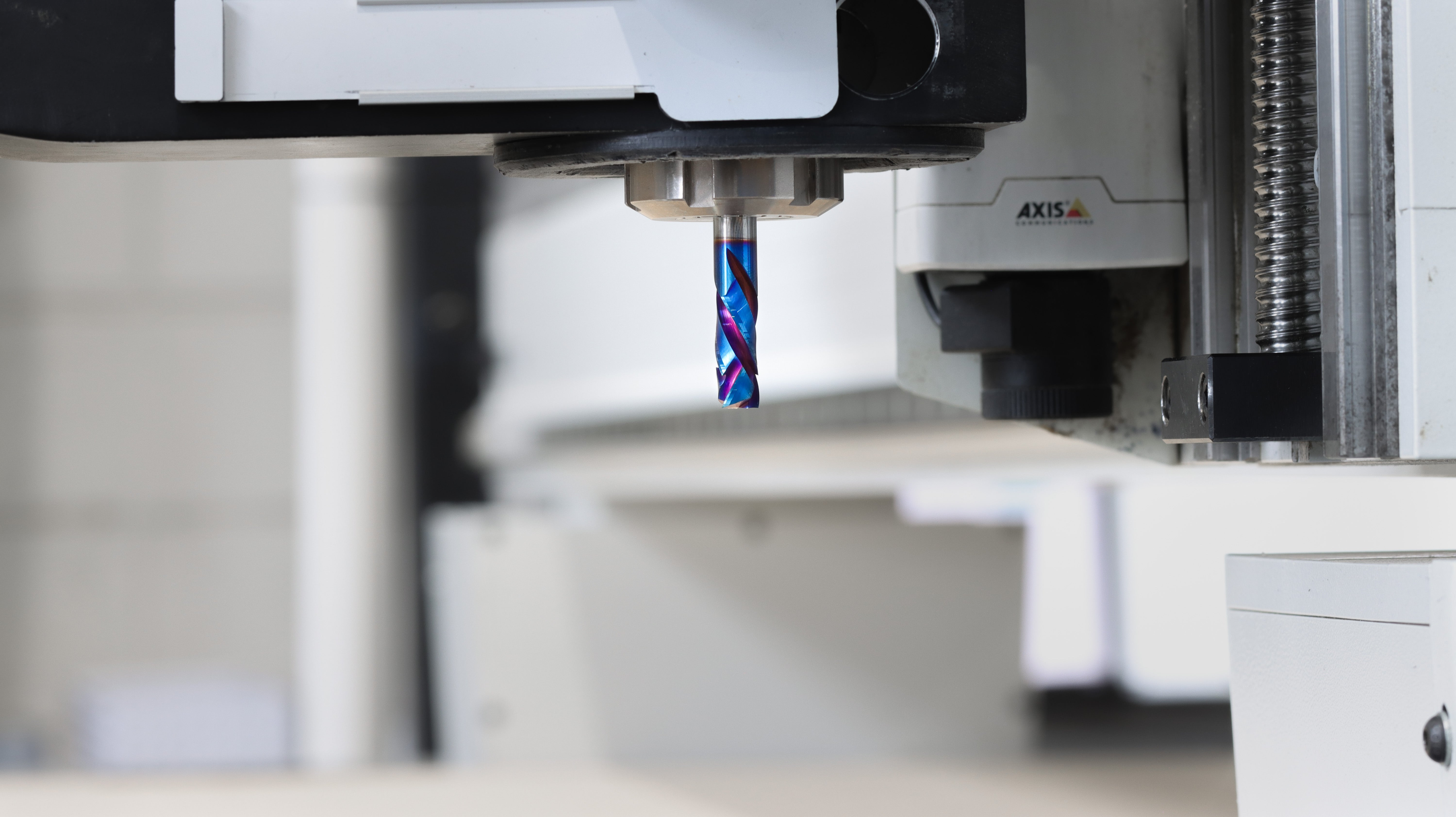 Atlas Tools Image of Blue Compression Bit in Tool Holder side shot